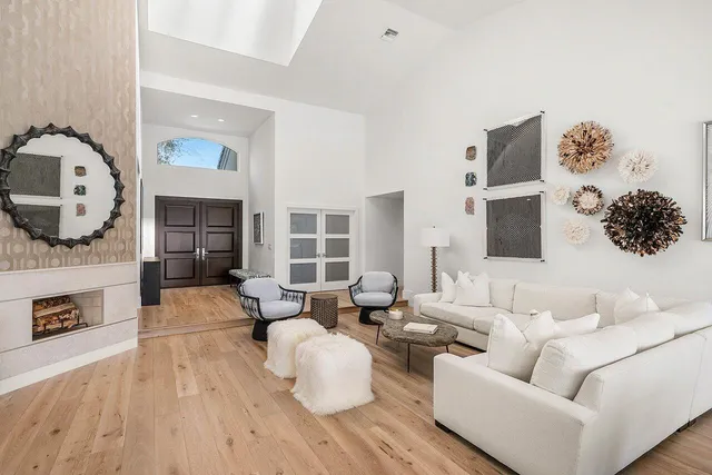 an aerial view of a house with a lake view