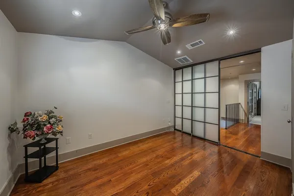 a bathroom with a bathtub shower sink and a toilet