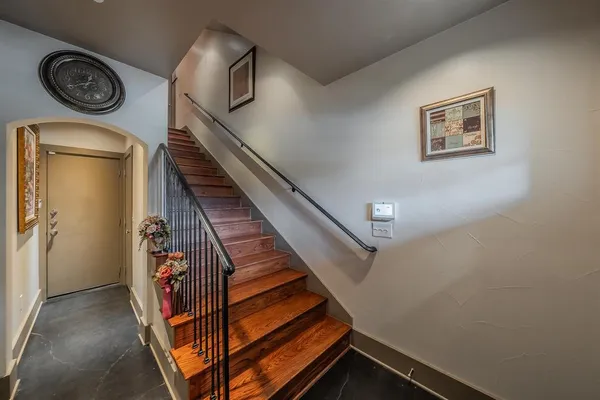 a view of entryway with wooden floor