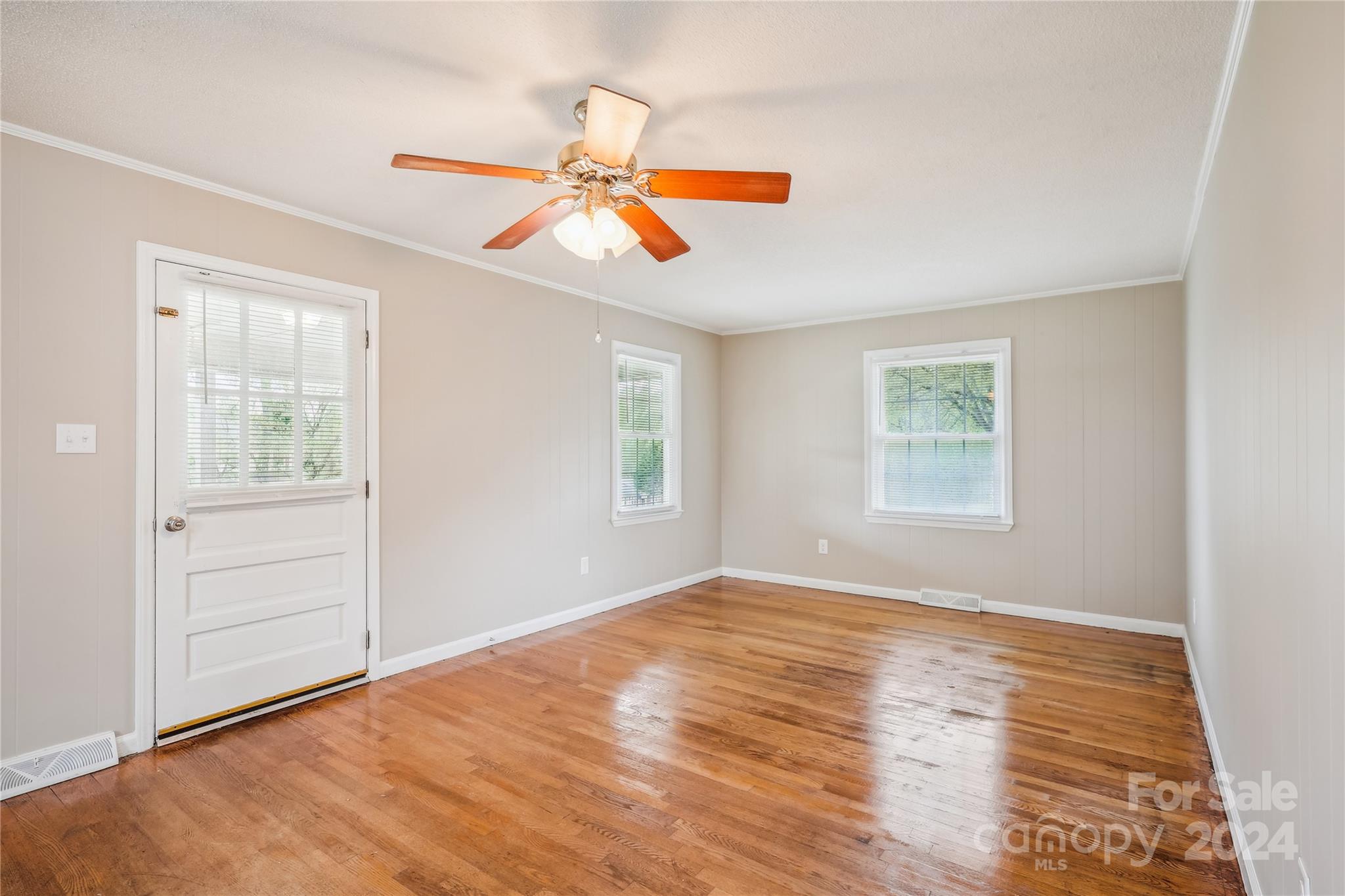 335 Pine Valley Road Salisbury, NC 28147 - Photo 21 of 31 an empty room with windows and fan