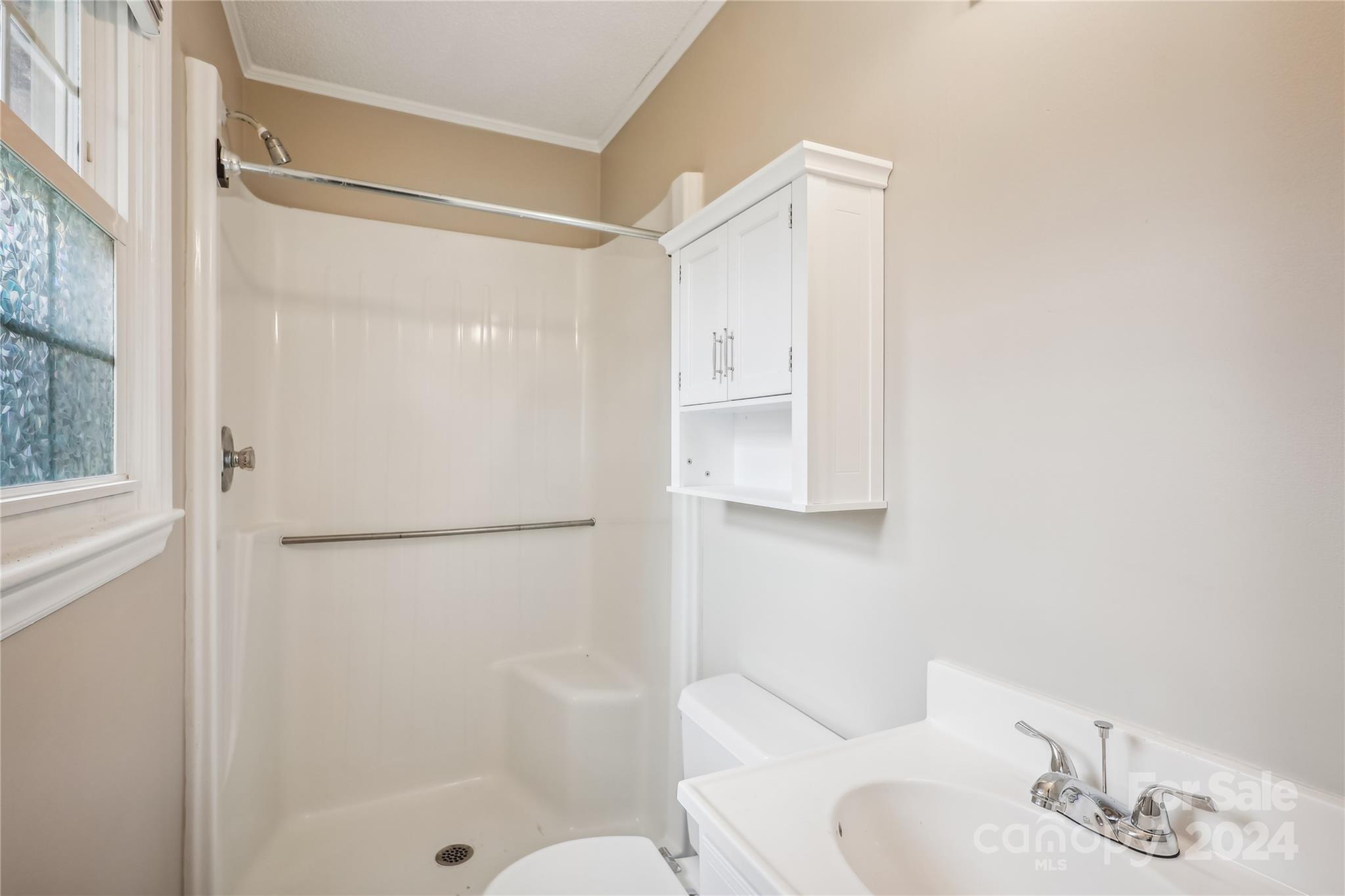 335 Pine Valley Road Salisbury, NC 28147 - Photo 27 of 31 a bathroom with a shower and a sink