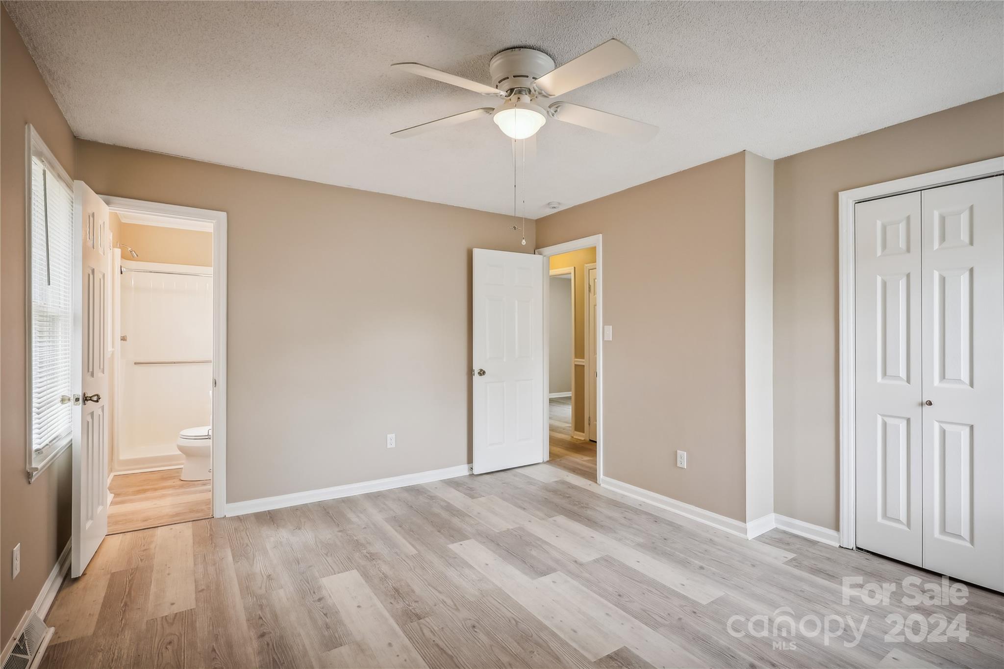 335 Pine Valley Road Salisbury, NC 28147 - Photo 29 of 31 an empty room with fan and entrance