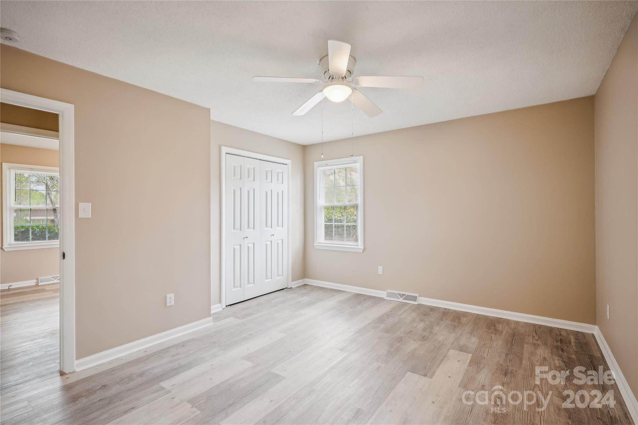 335 Pine Valley Road Salisbury, NC 28147 - Photo 30 of 31 wooden floor in an empty room with a window