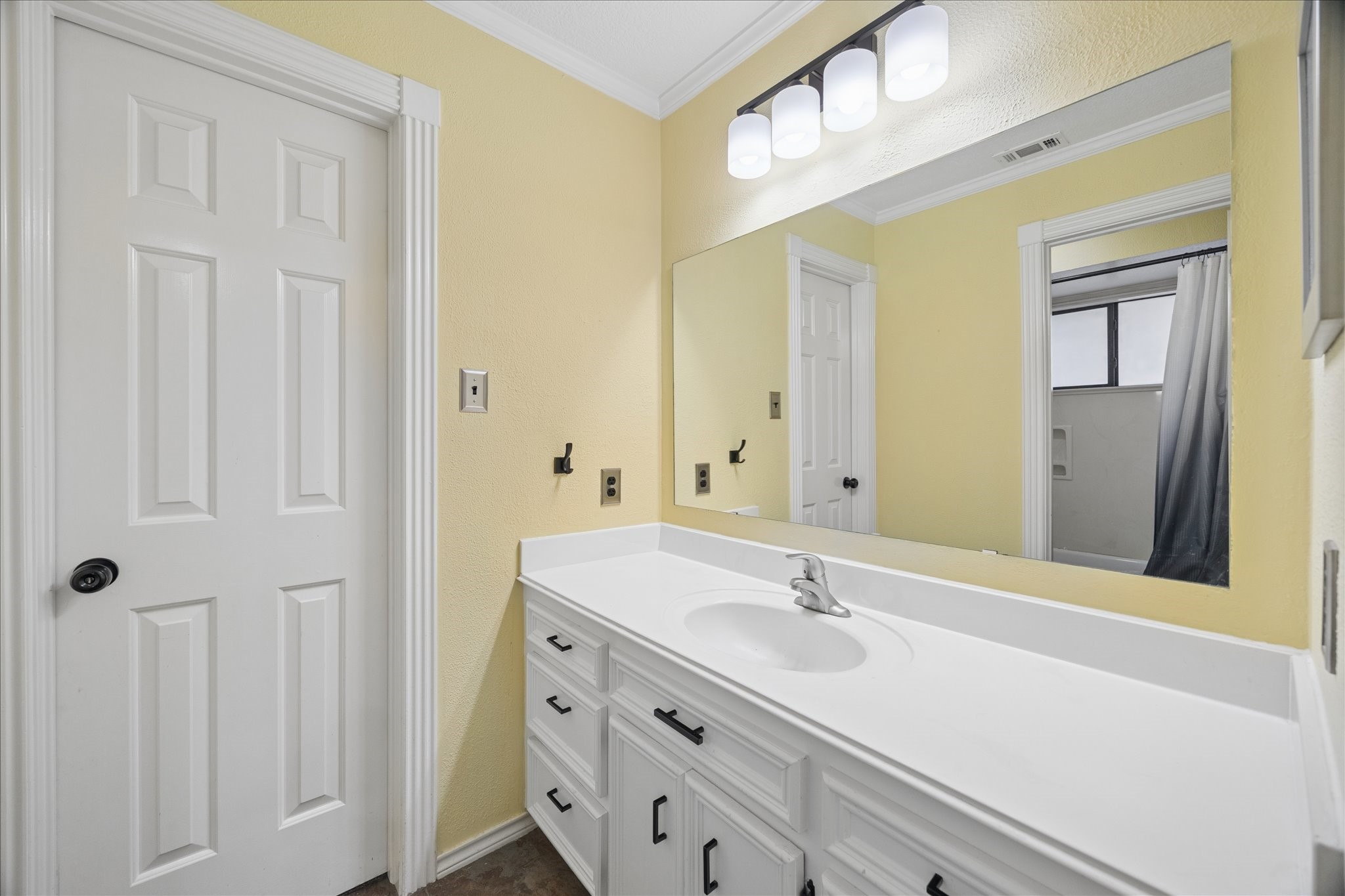 5823 Ashmere Lane Spring, TX 77379 - Photo 19 of 29 a bathroom with a sink and a mirror