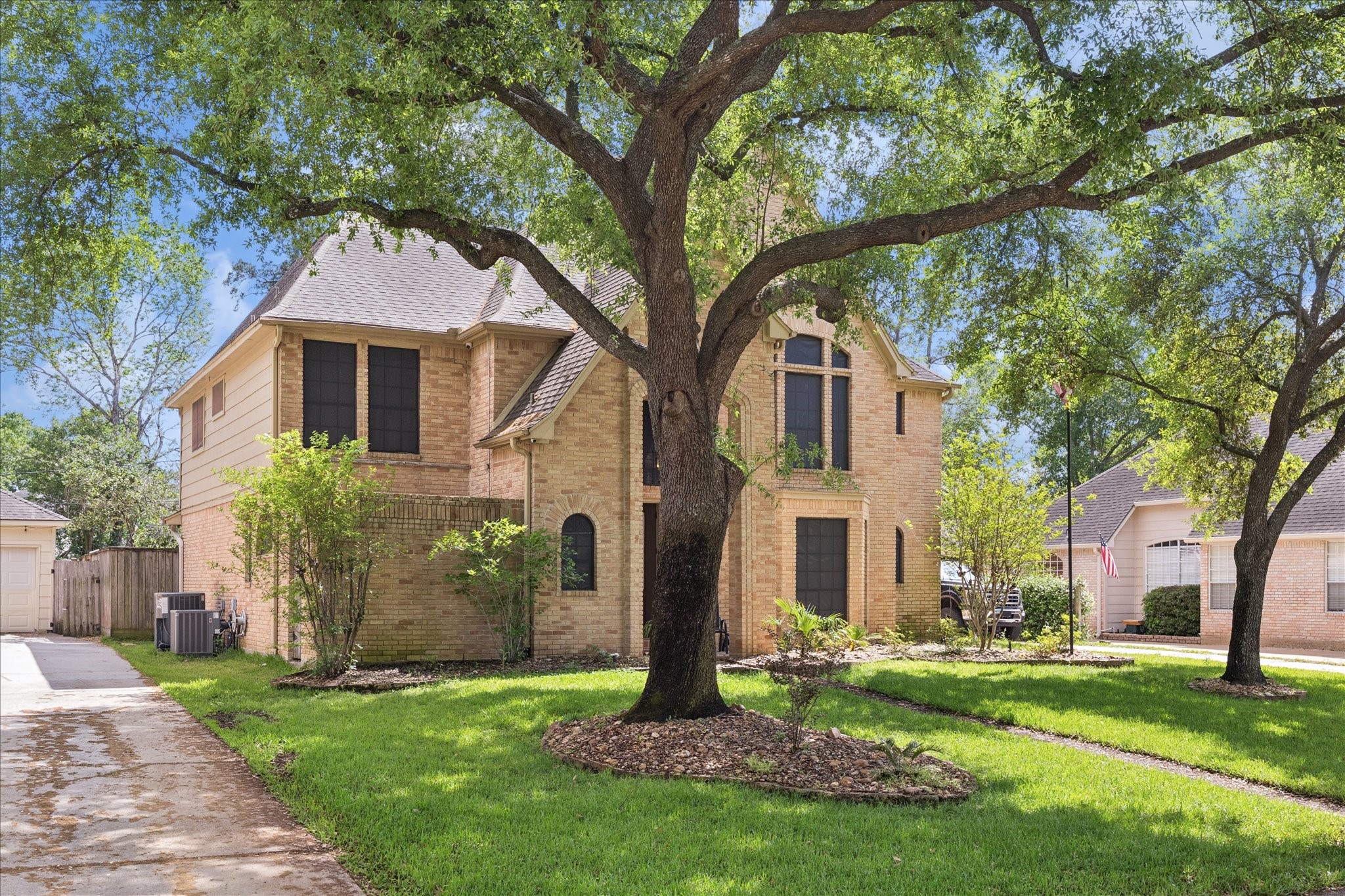 5823 Ashmere Lane Spring, TX 77379 - Photo 29 of 29 a front view of a house with a garden