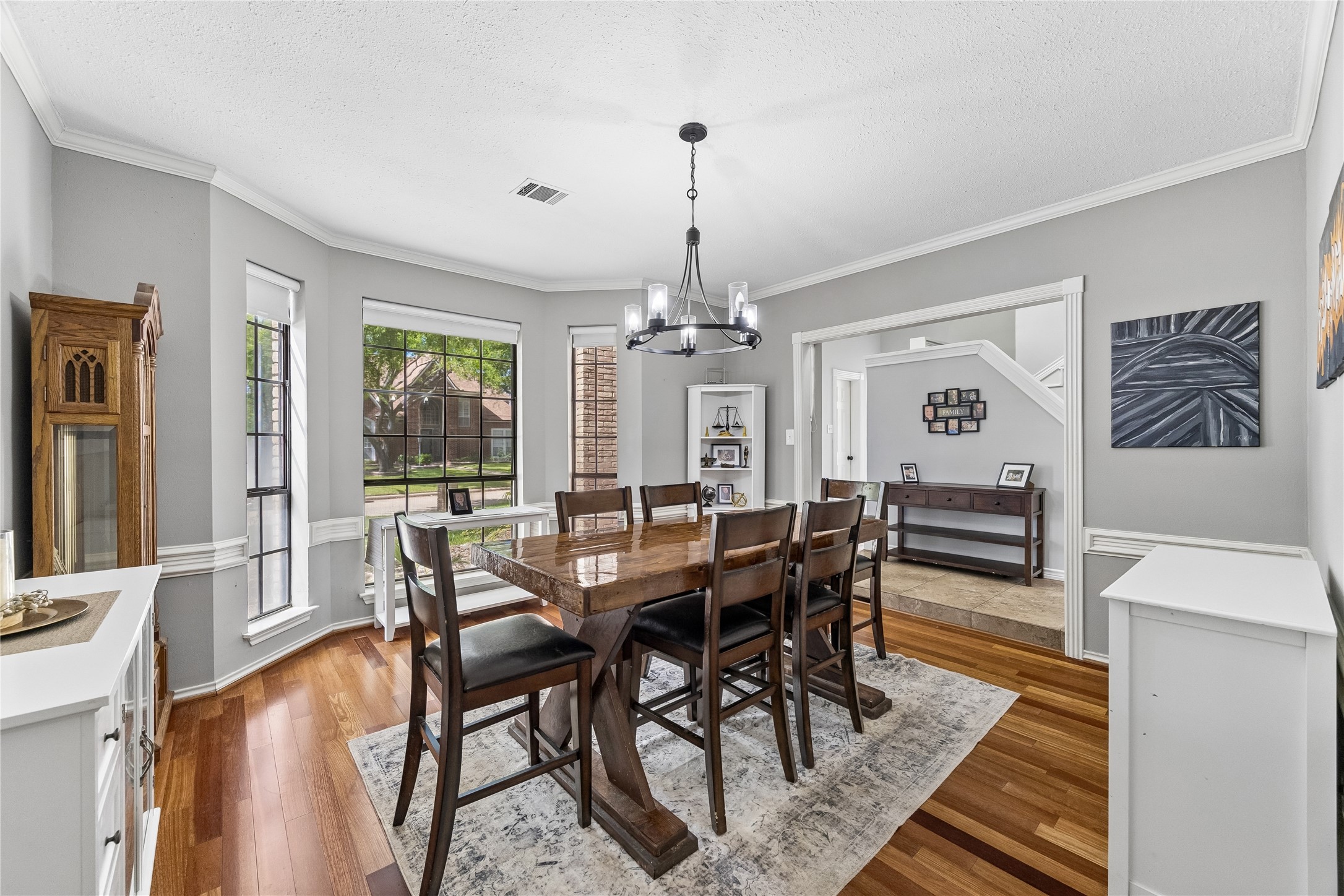 5823 Ashmere Lane Spring, TX 77379 - Photo 4 of 29 a view of a dining room with furniture window and wooden floor