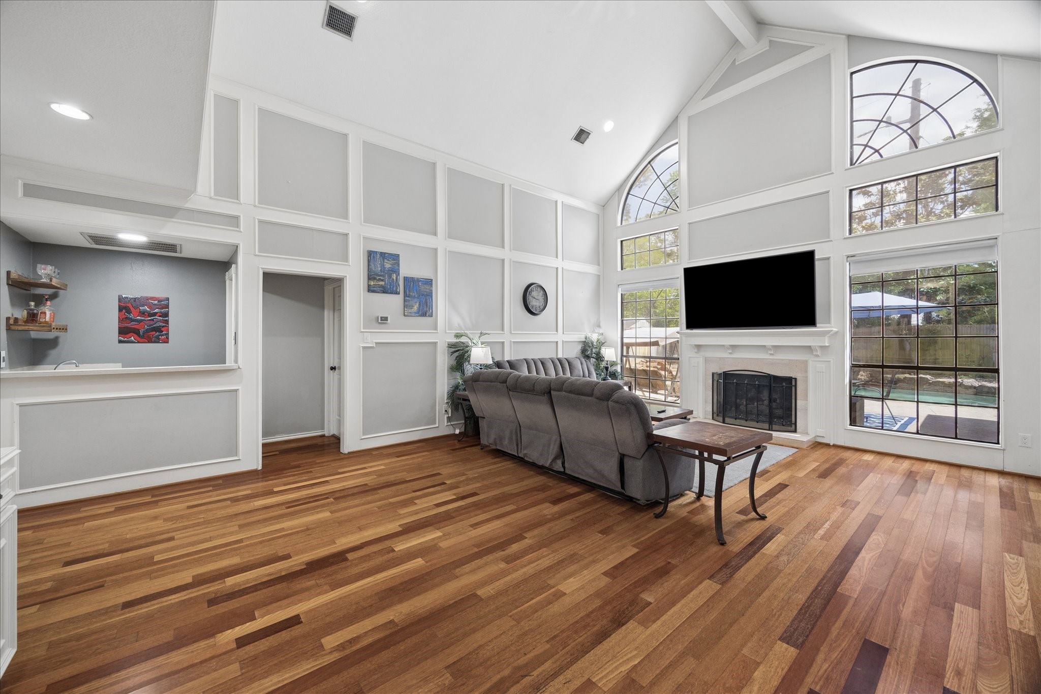 5823 Ashmere Lane Spring, TX 77379 - Photo 9 of 29 a living room with furniture wooden floor and a flat screen tv