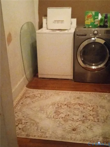 a view of a storage & utility room with a washer and dryer