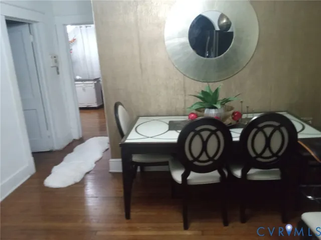 a bathroom with a sink mirror and toilet