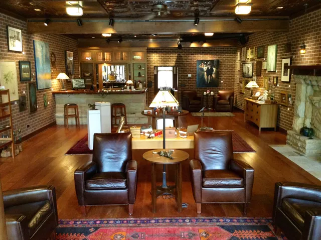 a room with lots of furniture and appliances