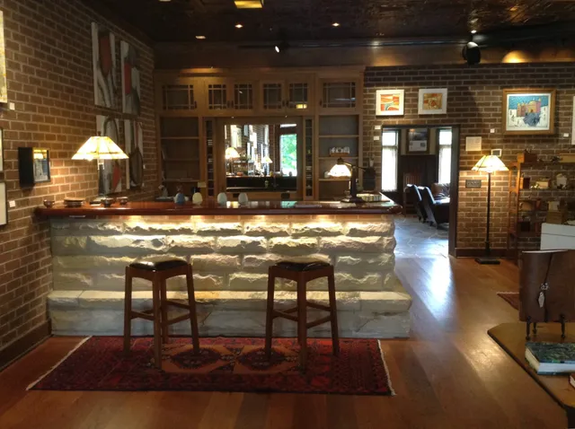 a view of swimming pool with outdoor seating