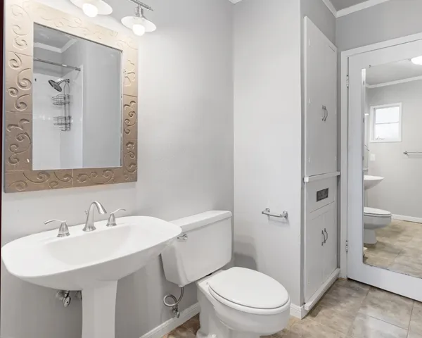 a bathroom with a bathtub and shower