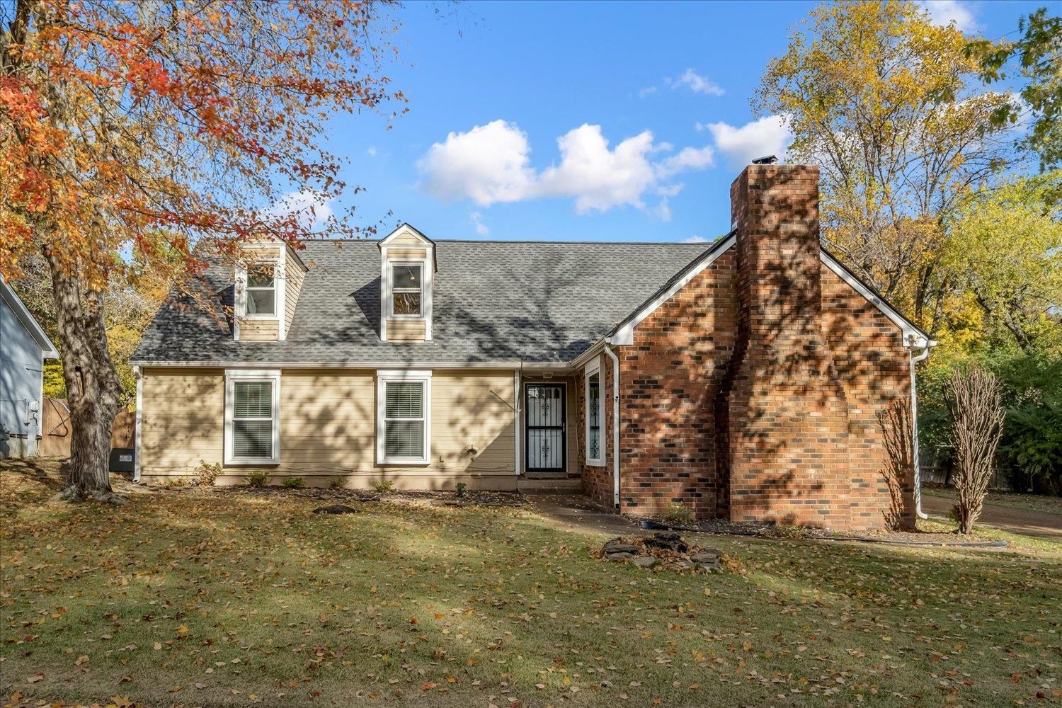 front view of a house with a street