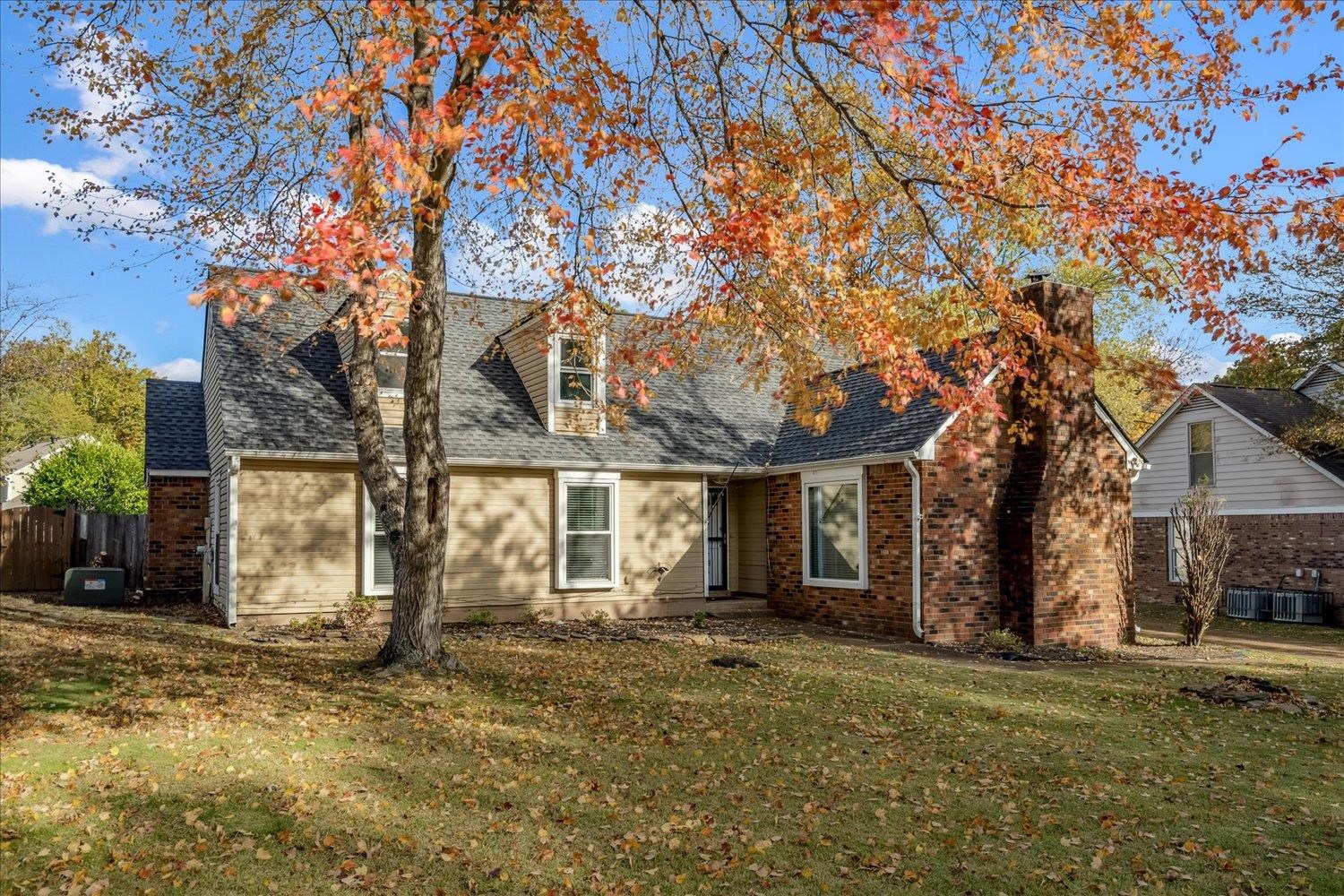 9516 El Hill Road Lakeland, TN 38002 - Photo 2 of 25 a front view of a house with a yard