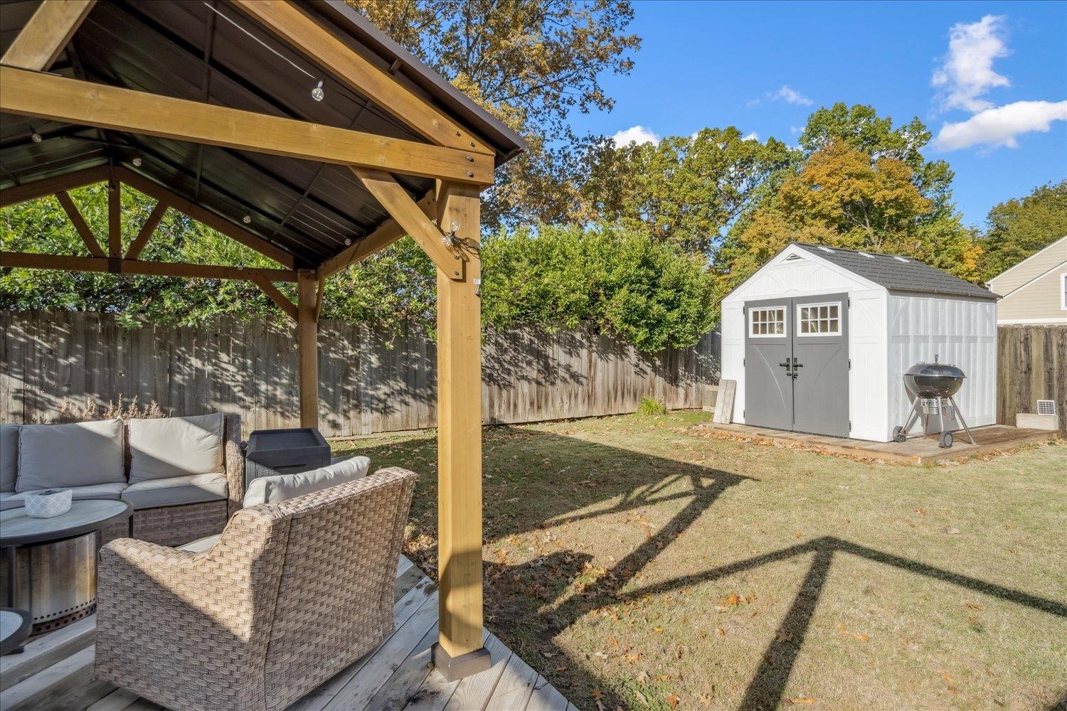 9516 El Hill Road Lakeland, TN 38002 - Photo 22 of 25 a front view of a house with garden