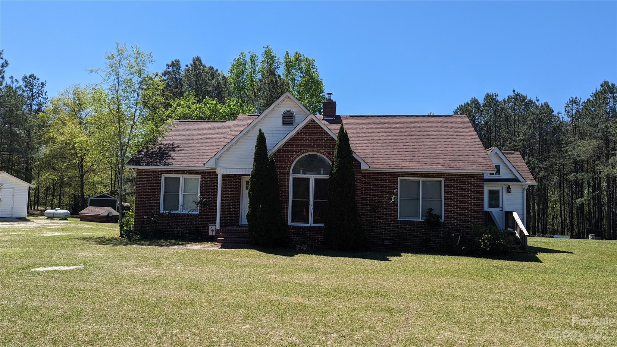 2059 Reece-Donahue Road Mount Croghan, SC 29727 - Photo 1 of 46 a front view of a house with a yard