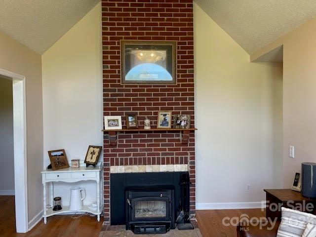 2059 Reece-Donahue Road Mount Croghan, SC 29727 - Photo 12 of 46 a bedroom with a fireplace and a table
