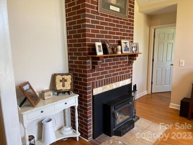 2059 Reece-Donahue Road Mount Croghan, SC 29727 - Photo 14 of 46 a view of fireplace and wooden floor