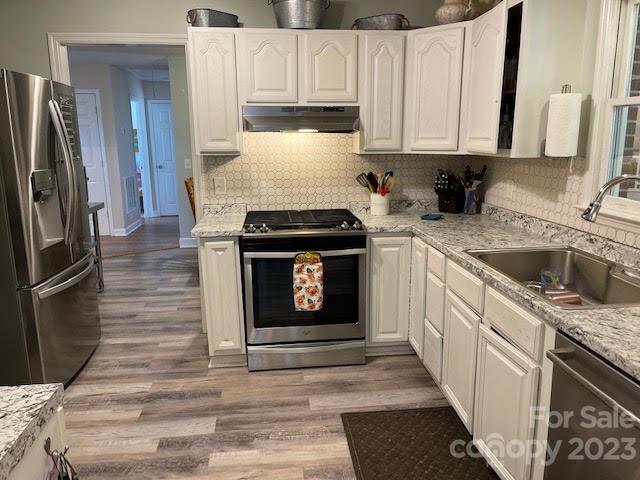 2059 Reece-Donahue Road Mount Croghan, SC 29727 - Photo 2 of 46 a kitchen with stainless steel appliances granite countertop a stove a refrigerator and a sink