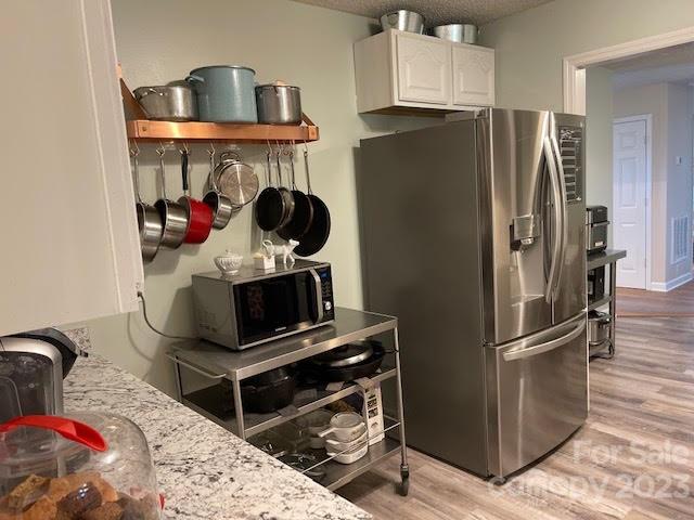 2059 Reece-Donahue Road Mount Croghan, SC 29727 - Photo 3 of 46 a kitchen with stainless steel appliances granite countertop a refrigerator stove and sink