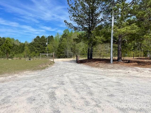 2059 Reece-Donahue Road Mount Croghan, SC 29727 - Photo 34 of 46 a view of outdoor space with deck and yard
