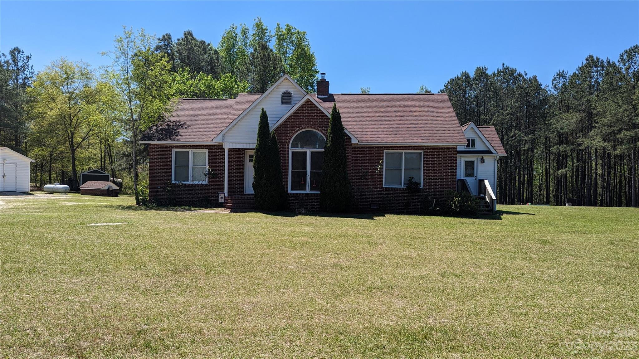2059 Reece-Donahue Road Mount Croghan, SC 29727 - Photo 46 of 46 a front view of a house with a yard and garage