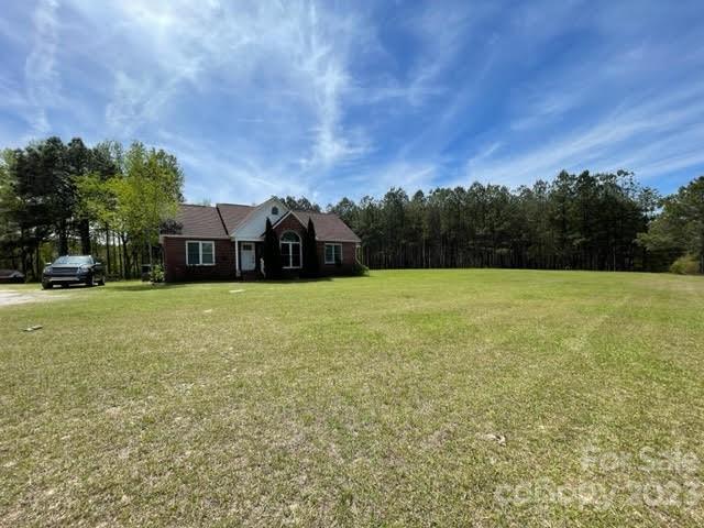 2059 Reece-Donahue Road Mount Croghan, SC 29727 - Photo 7 of 46 a view of a house with a yard