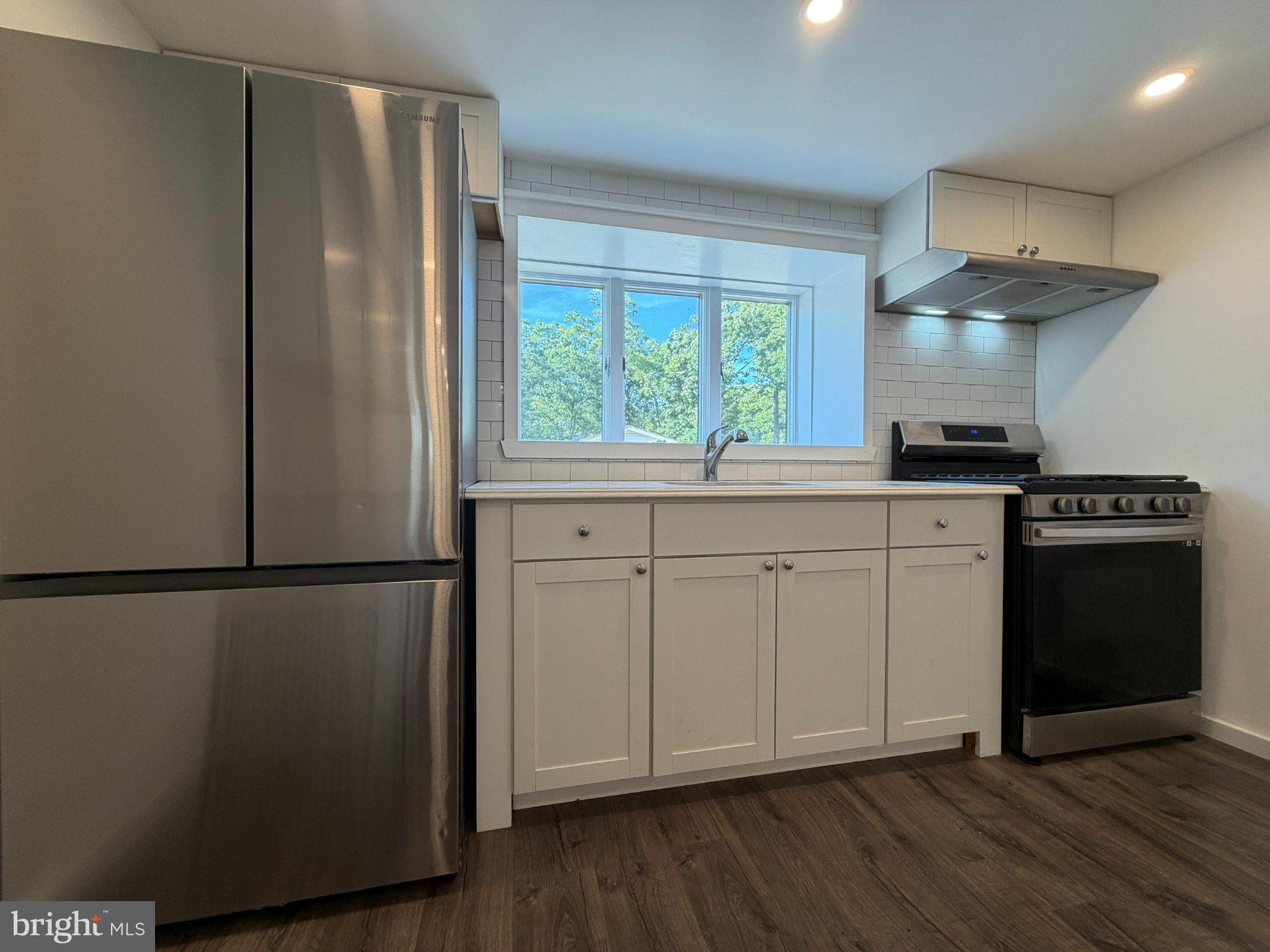 66 Roberts Road Toms River, NJ 08755 - Photo 5 of 13 Modern kitchen with sleek appliances.