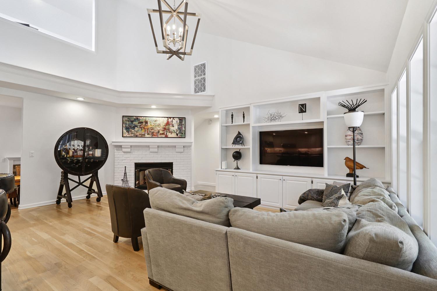 51 Covered Bridge Road Carmichael, CA 95608 - Photo 29 of 86 a living room with furniture a fireplace and a flat screen tv