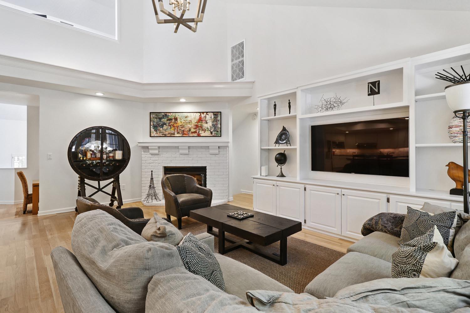 51 Covered Bridge Road Carmichael, CA 95608 - Photo 33 of 86 a living room with furniture a flat screen tv and a fireplace