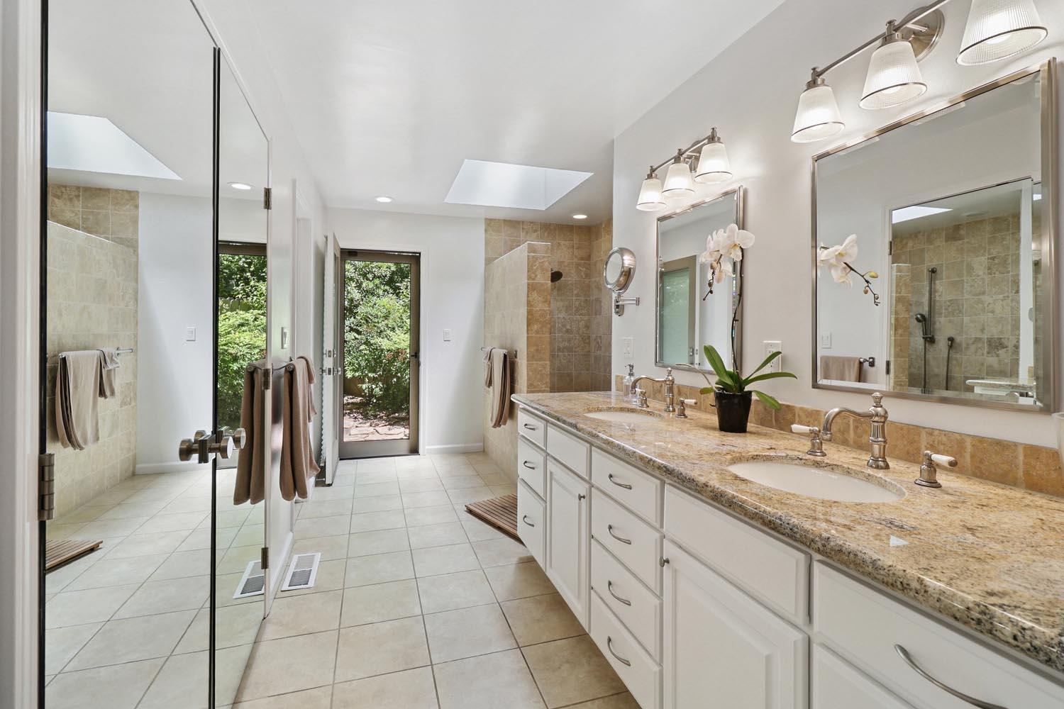 51 Covered Bridge Road Carmichael, CA 95608 - Photo 52 of 86 a spacious en suite bathroom with a granite countertop sink mirror and shower