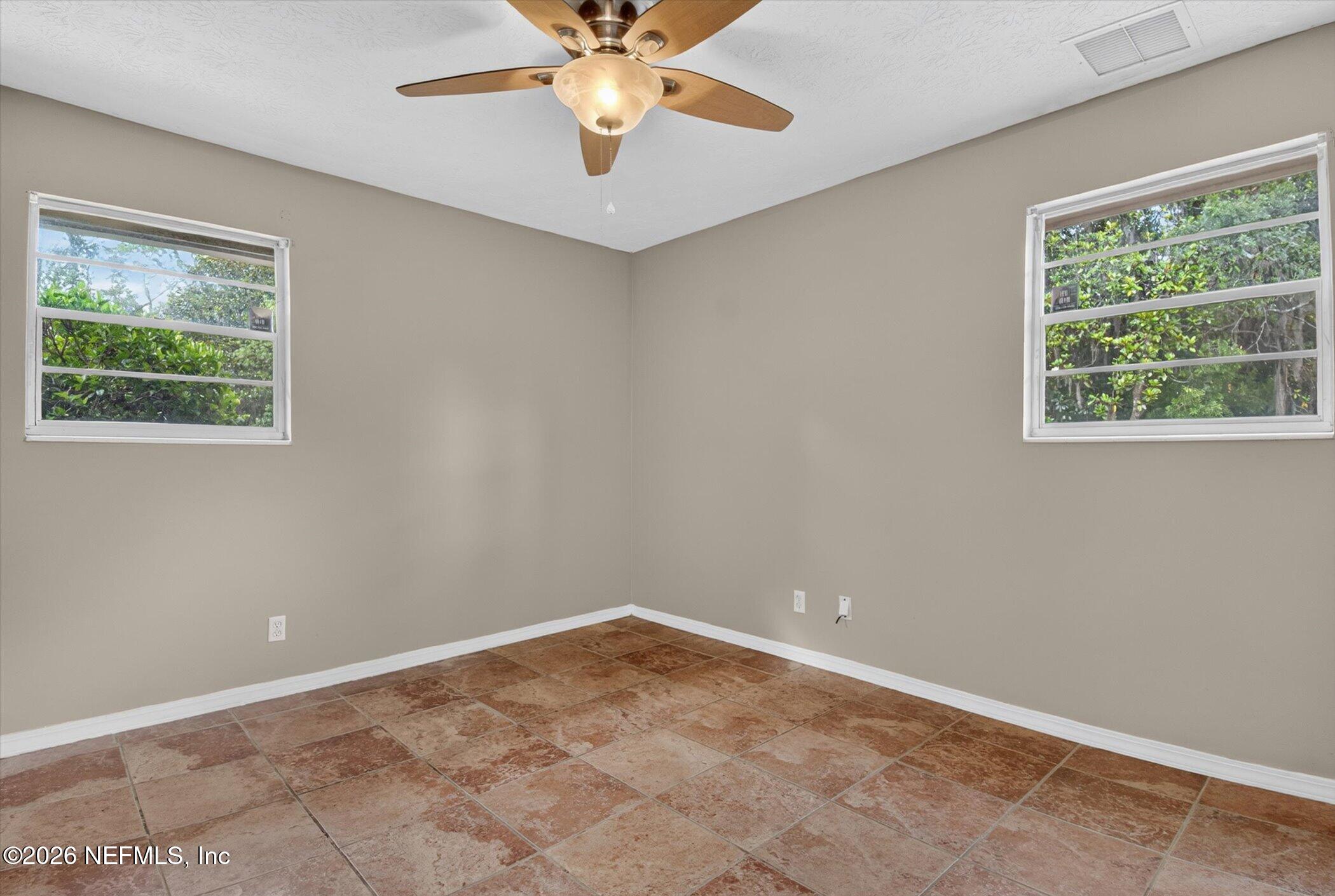 2705 Navajo Road Orange Park, FL 32073 - Photo 28 of 58 an empty room with a window