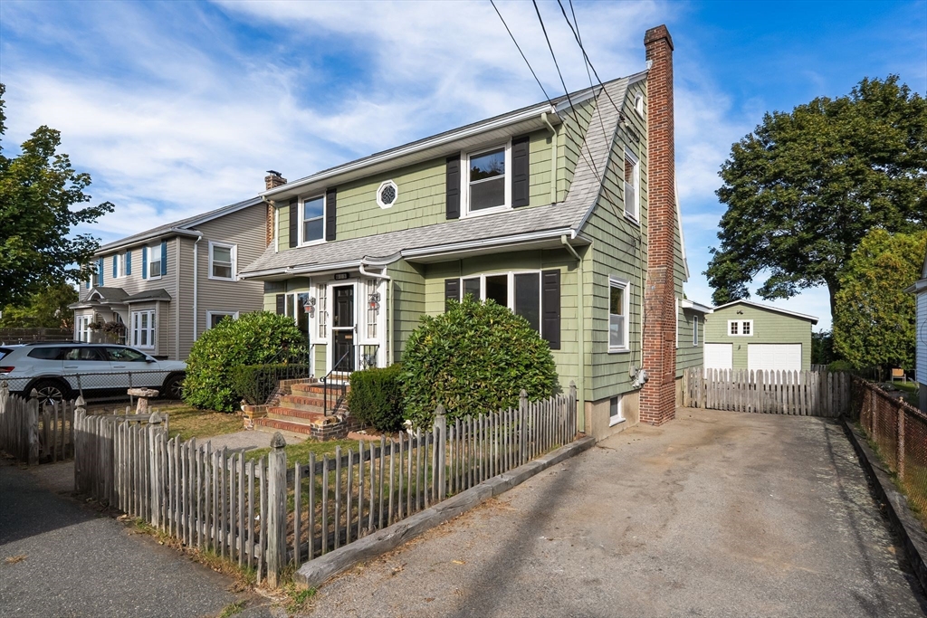 18 Hummock Road Quincy, MA 02171 - Photo 2 of 37 a front view of house with yard and trees