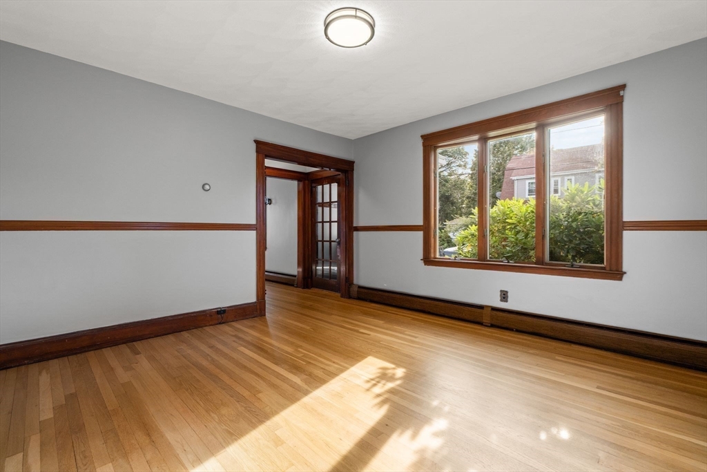 18 Hummock Road Quincy, MA 02171 - Photo 10 of 37 a view of an empty room with a window