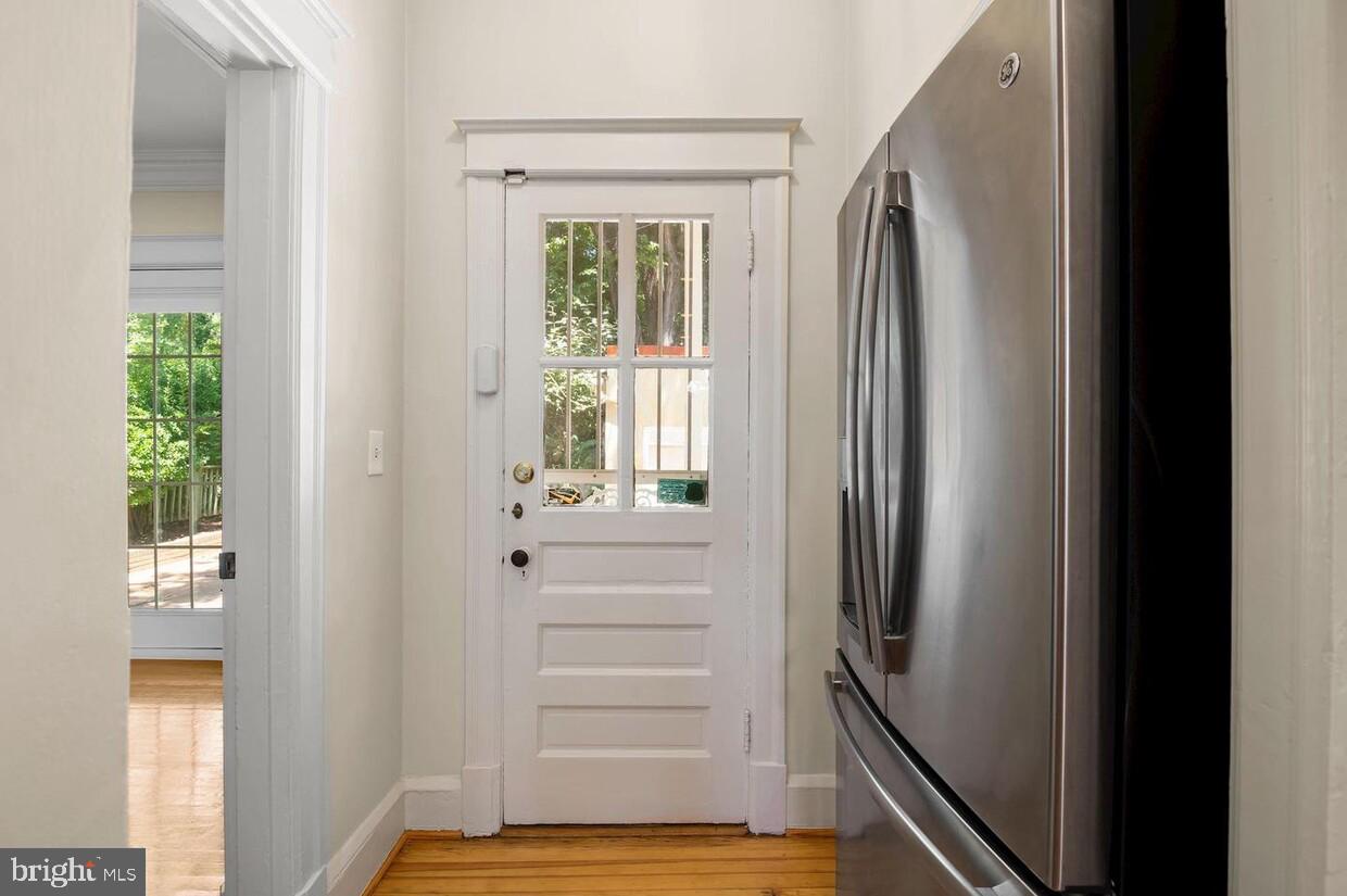 3403 Woodley Road Northwest Washington, DC 20016 - Photo 11 of 17 Back door out to 2 car garage and back pation