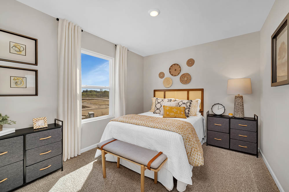 1283 Foxglove Drive Bartlett, IL 60103 - Photo 19 of 21 a bedroom with a bed and a window