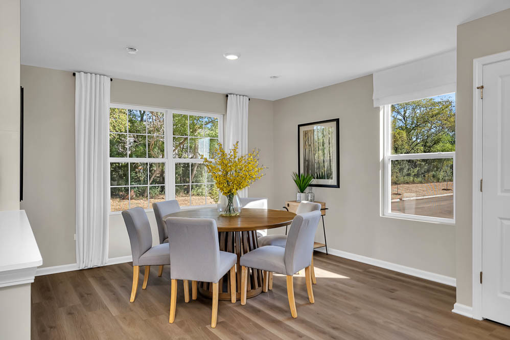 1283 Foxglove Drive Bartlett, IL 60103 - Photo 10 of 21 a view of a dining room with furniture and wooden floor
