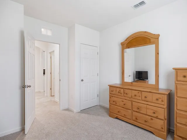 a room with furniture and a window