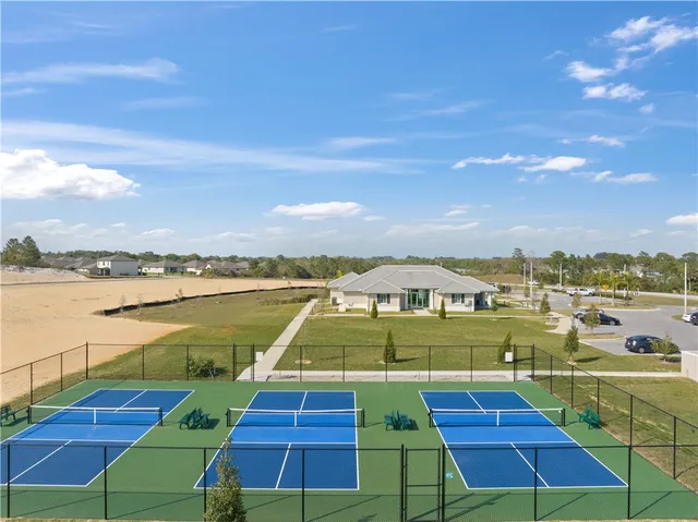 a view of a livingroom with furniture and a window