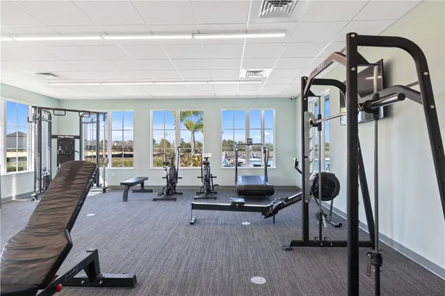 an aerial view of a house with a big yard