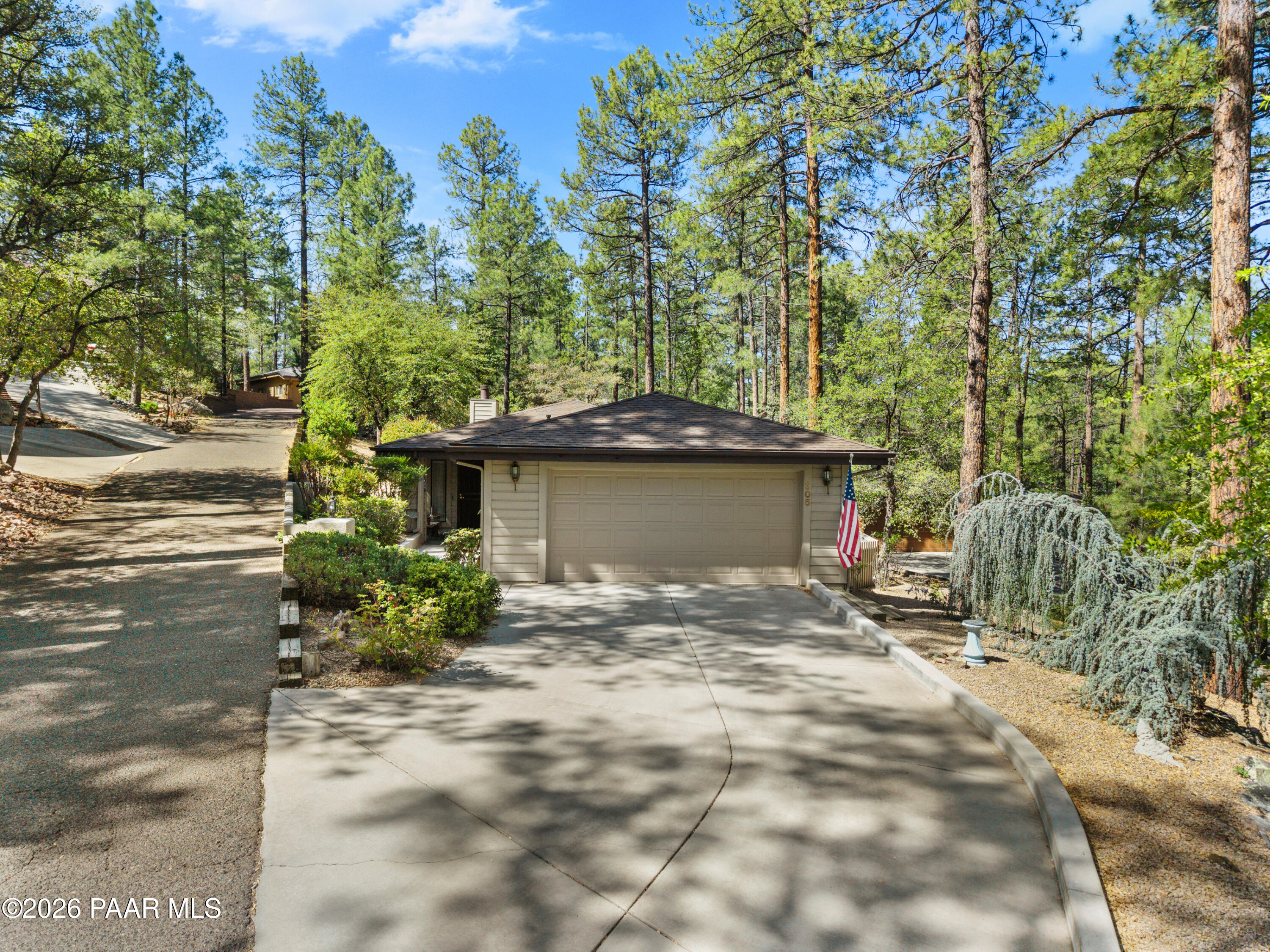 305 Ridge Court Prescott, AZ 86303 - Photo 1 of 35 a view of a house with a yard and sitting area
