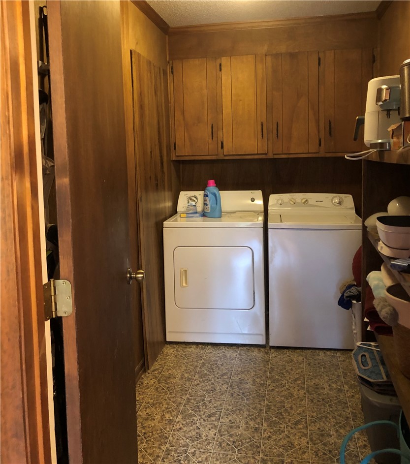 101 Victorian Drive Anderson, SC 29625 - Photo 13 of 26 This dedicated utility space offers convenient laundry facilities and ample storage.