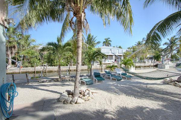 hammock, lounge chairs extra 1/2 lot