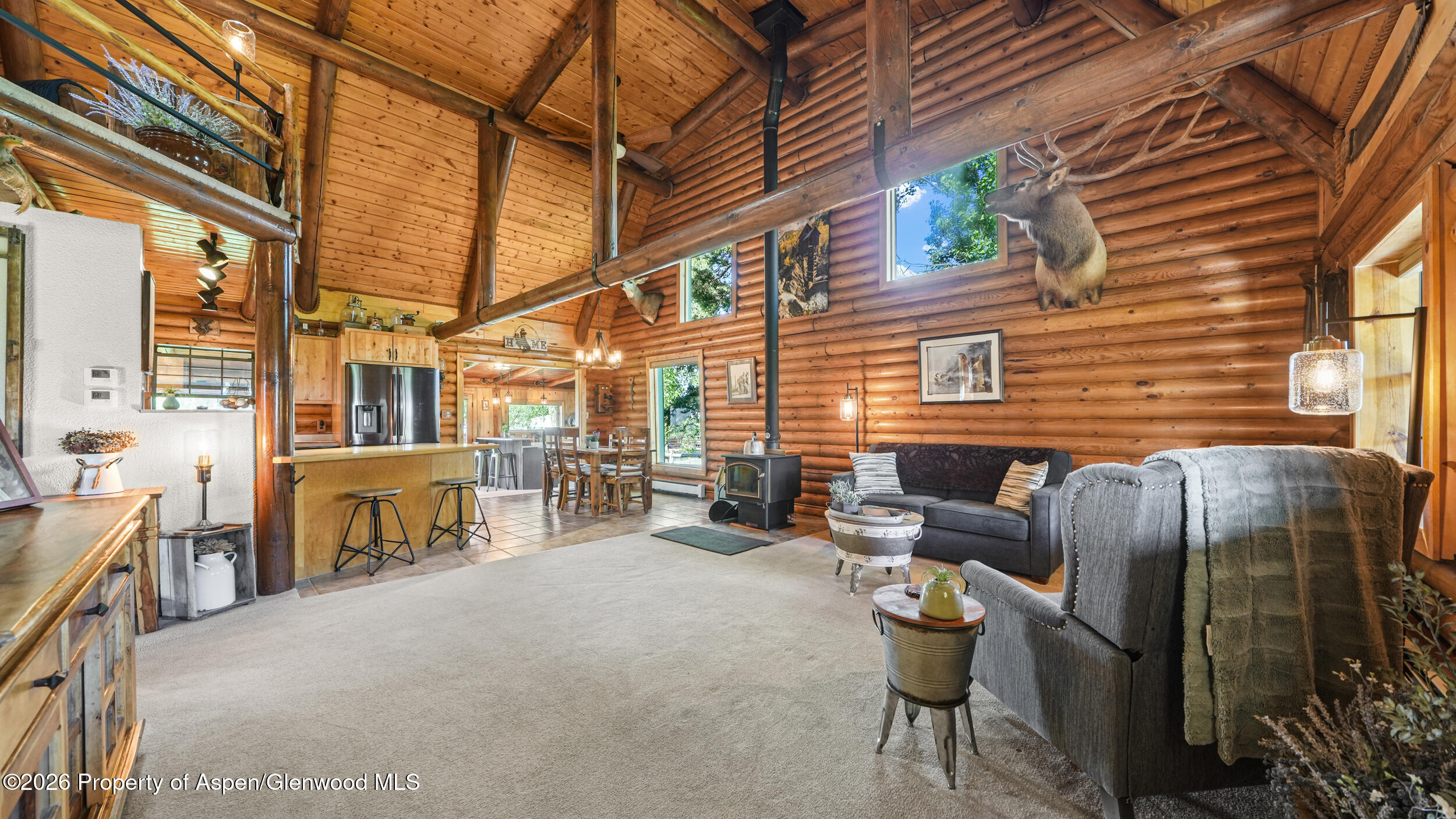 1355 N Road Loma, CO 81524 - Photo 12 of 51 a building outdoor space with patio furniture