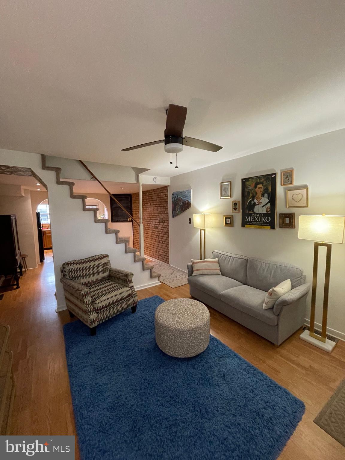 1841 Light Street Baltimore, MD 21230 - Photo 2 of 21 a living room with furniture and a flat screen tv