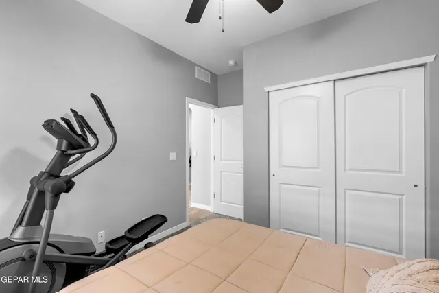 a kitchen with kitchen island a sink stove and refrigerator