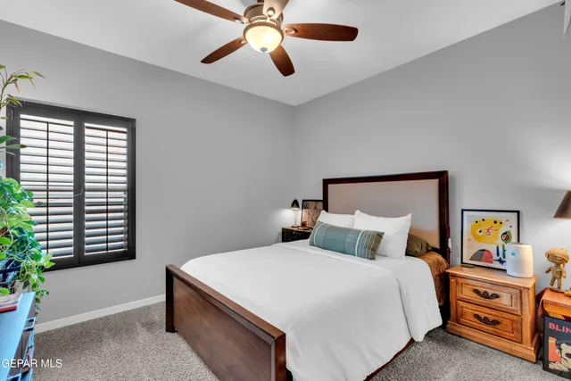 a kitchen with counter top space appliances and wooden floor