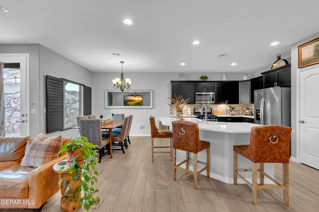 a bathroom with 2 sink and a bathtub