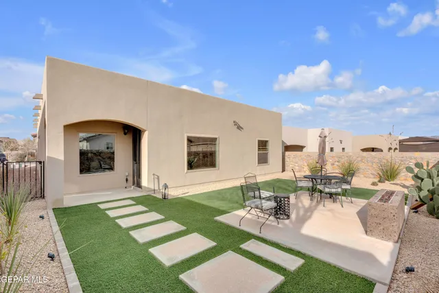 a view of a house with a terrace