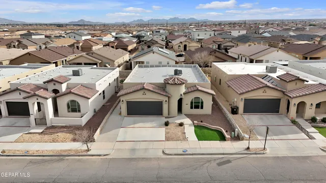 an aerial view of a city with lots of residential buildings